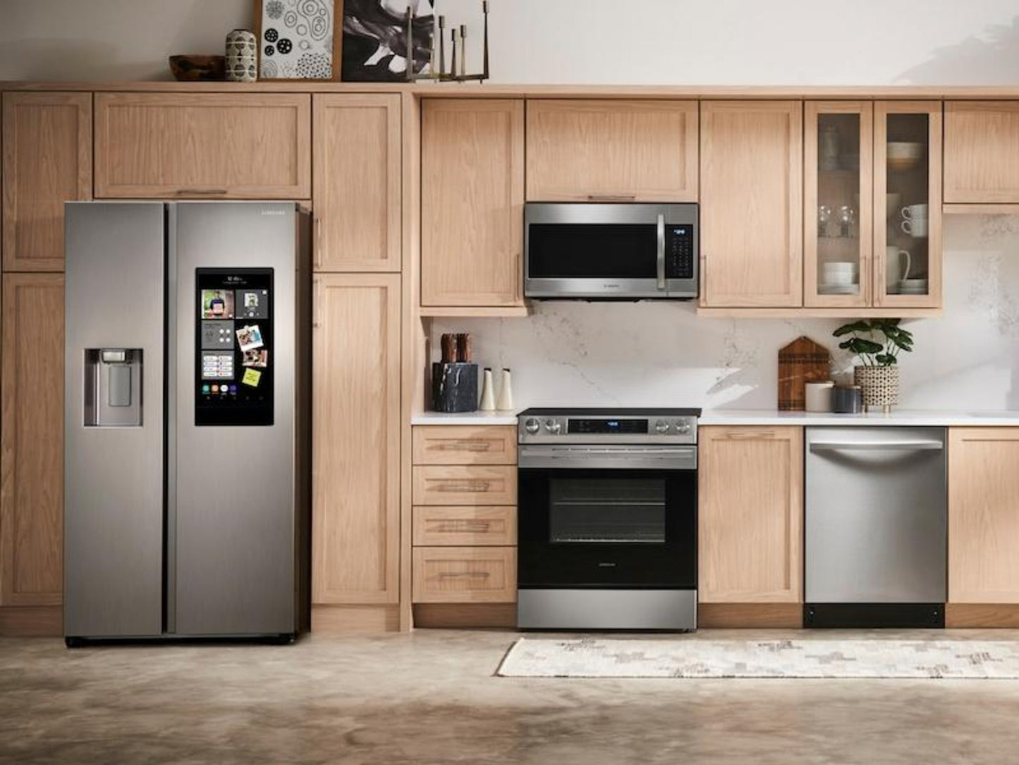 SAMSUNG 26.7 cu. ft. Large Capacity Side-by-Side Refrigerator with Touch Screen Family Hub™ in Stainless Steel - RS27T5561SR-KT